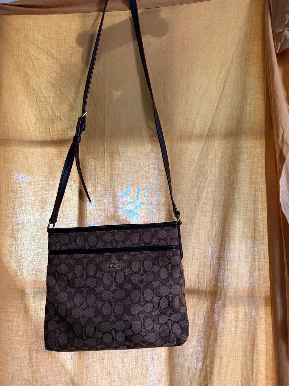 Coach Signature Canvas Messenger Bag in Dark Brown/Black Trim